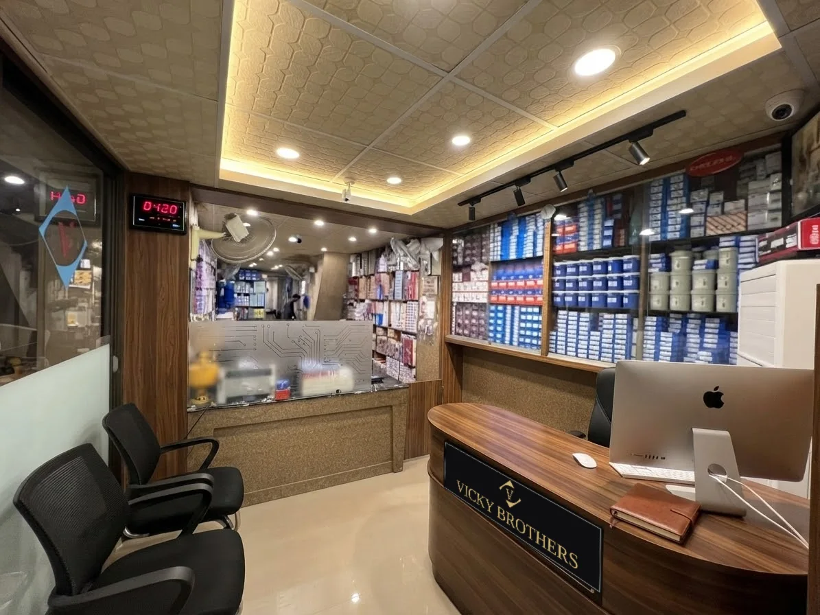 Inside the Vicky Brothers shop, shelves stocked with branded part boxes
